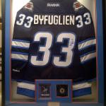 Sports memorabilia can be customized in a more deliberate way. Add photos, signed merchandise, cards to the framing piece for a more compete result. One sided jersey framing has a fee of only $499.00, and this includes any other additives desired!  
